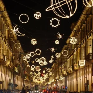 Stefania-Christmas-in-Turin-Luci-d-Artista-lights-hanging-above-the-street-Turismo-Torino-e-Provincia