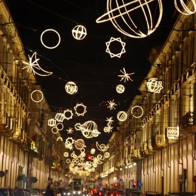 Stefania-Christmas-in-Turin-Luci-d-Artista-lights-hanging-above-the-street-Turismo-Torino-e-Provincia